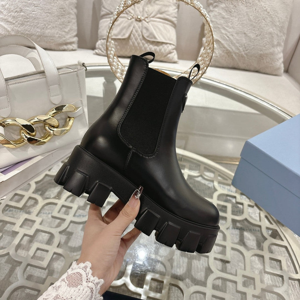 PRADA 26S MONOLITH CHELSEA BOOTS IN BLACK CALFSKIN AND FABRIC
