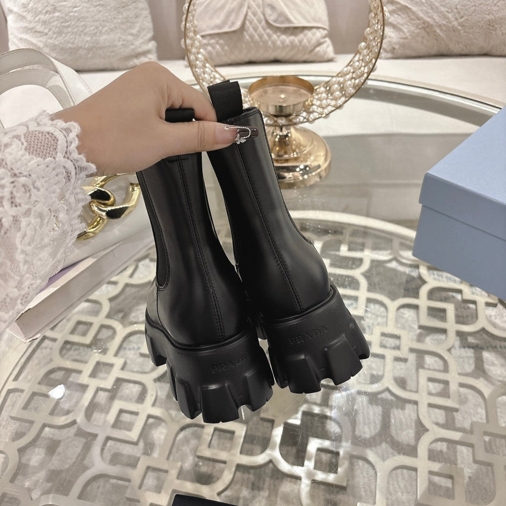 PRADA 26S MONOLITH CHELSEA BOOTS IN BLACK CALFSKIN AND FABRIC