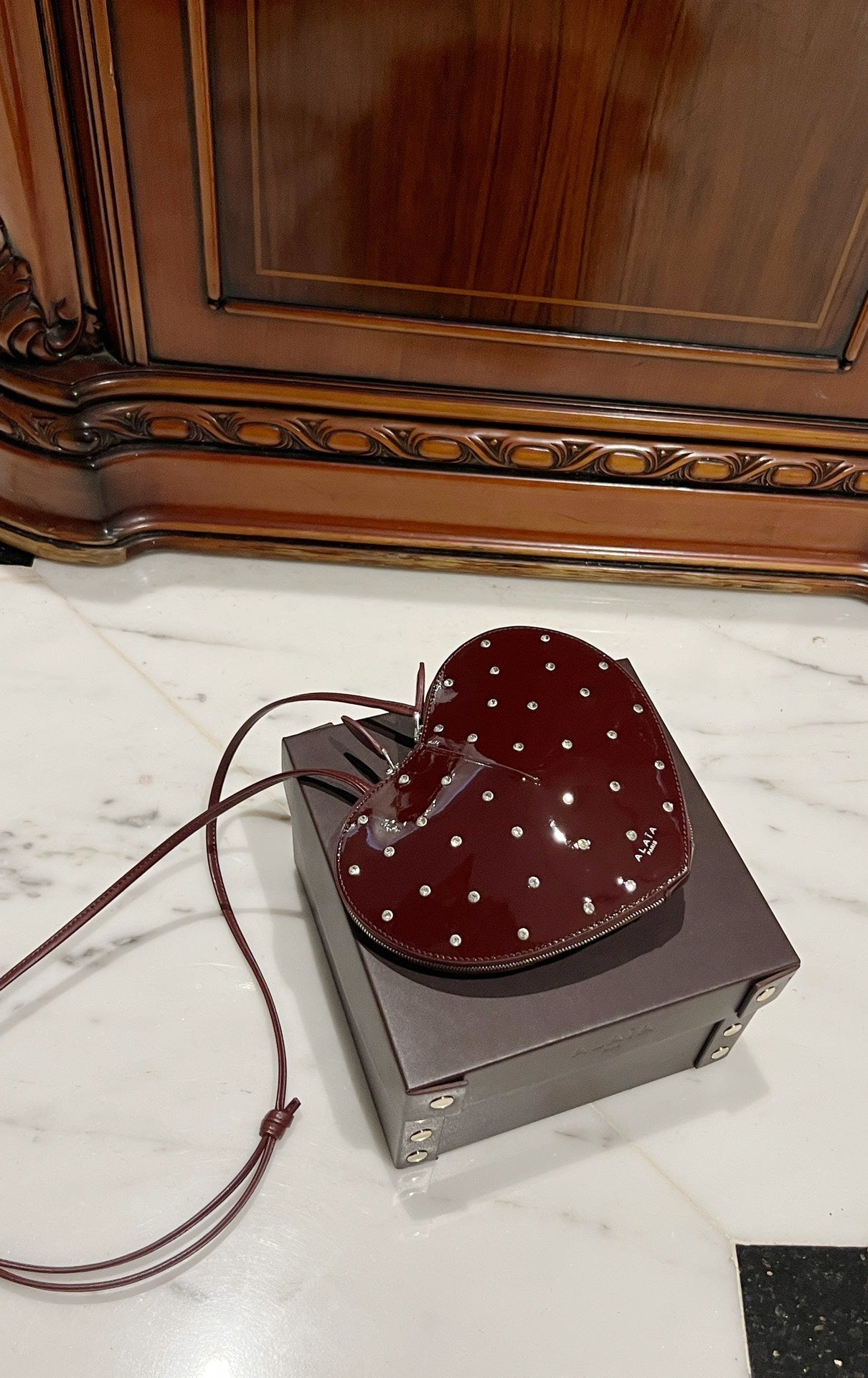 LE COEUR BAG 21 IN BURGUNDY RED PATENT CALFSKIN ATTACHED STRASS