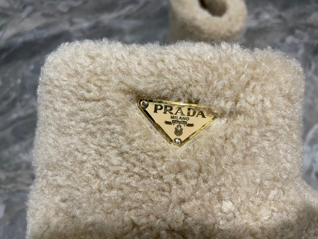 PRADA 26S ANKLE BOOTS IN BEIGE FUR