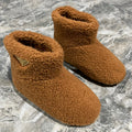PRADA 26S ANKLE BOOTS IN CARAMEL BROWN FUR