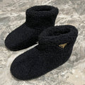 PRADA 26S ANKLE BOOTS IN BLACK FUR