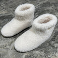 PRADA 26S ANKLE BOOTS IN WHITE FUR