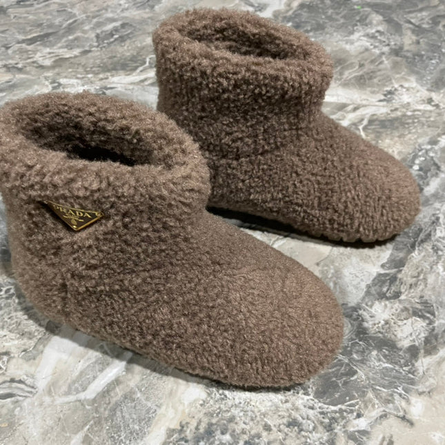 PRADA 26S ANKLE BOOTS IN DARK BROWN FUR