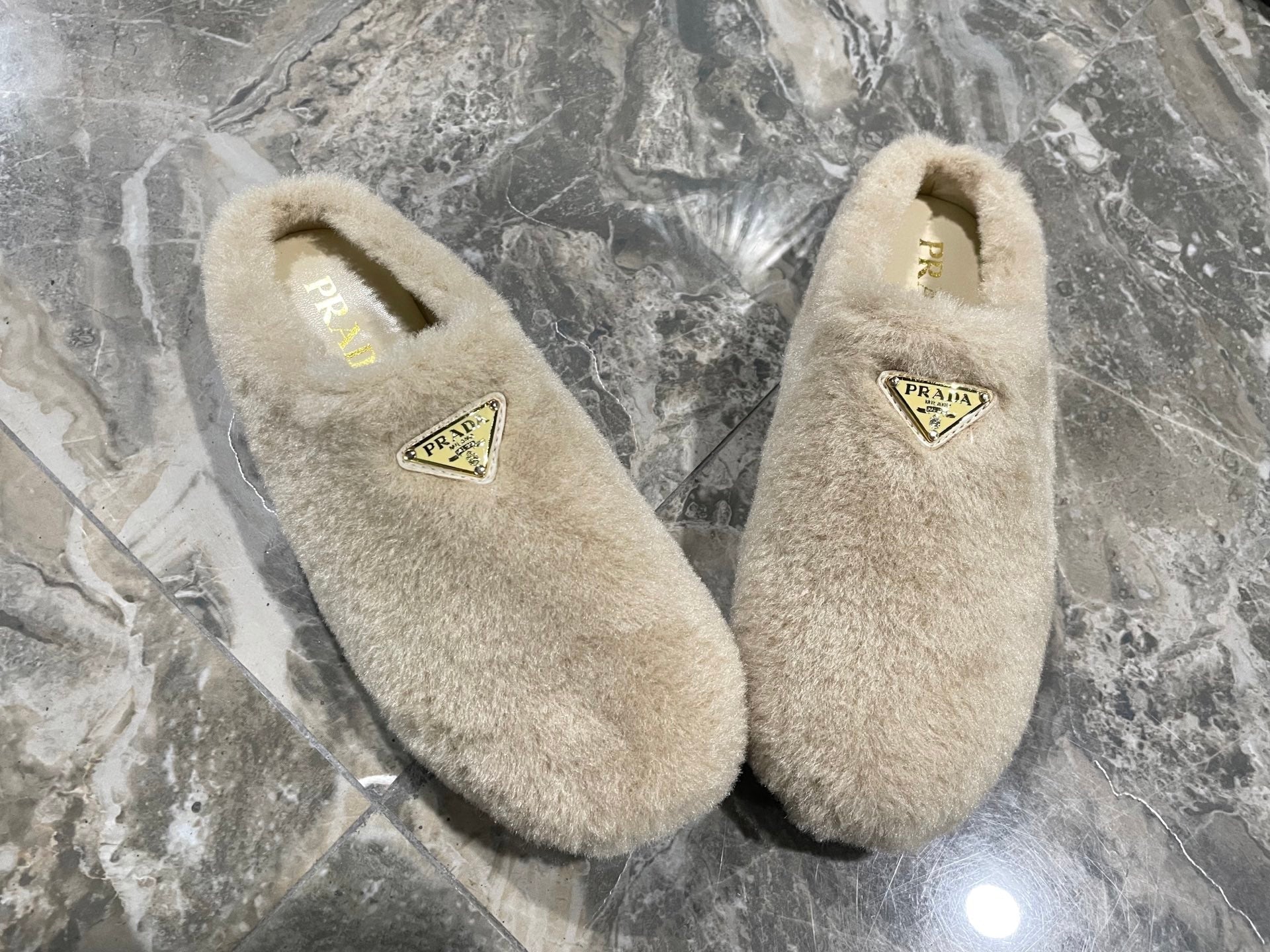 PRADA 26S SLIPPERS IN BEIGE WOOL