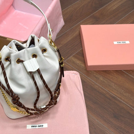 DRAWSTRING BUCKET BAG 21 IN WHITE CANVAS GOLD HARDWARE