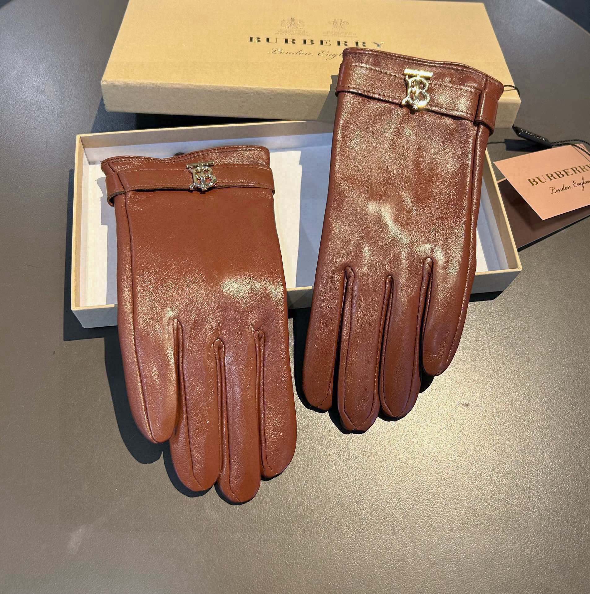 GLOVES IN BRONZE BROWN LAMBSKIN WITH FLEECE LINING 440495