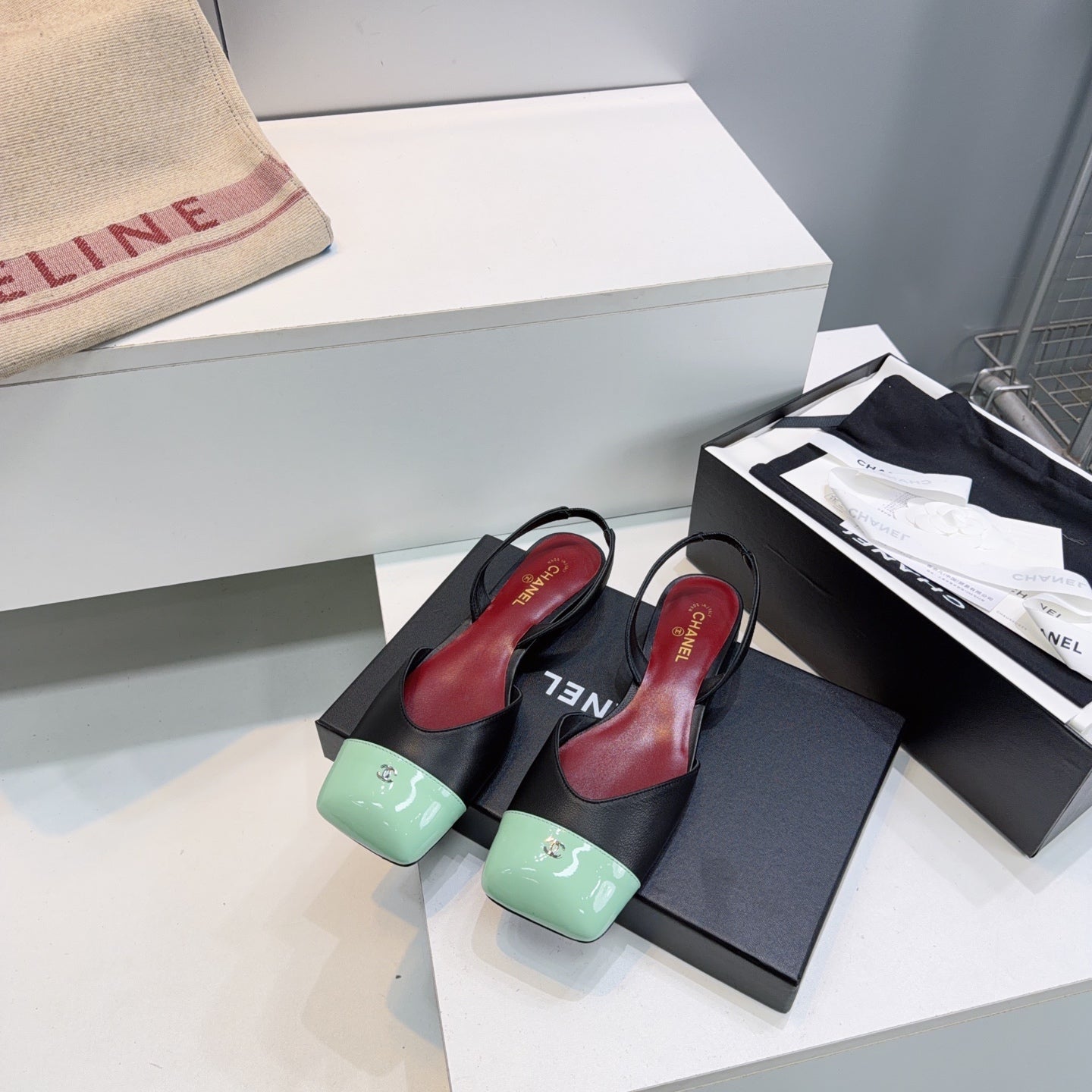 CHANEL 26S FLAT SLINGBACK IN BLACK LAMBSKIN WITH MINT GREEN CAP TOE