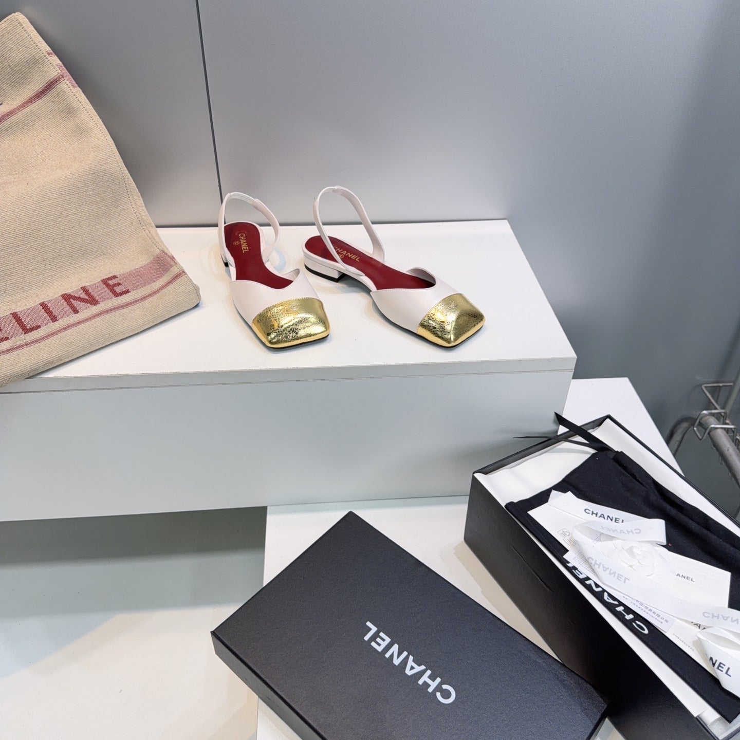 CHANEL 26S FLAT SLINGBACK IN WHITE LAMBSKIN WITH GOLD CAP TOE