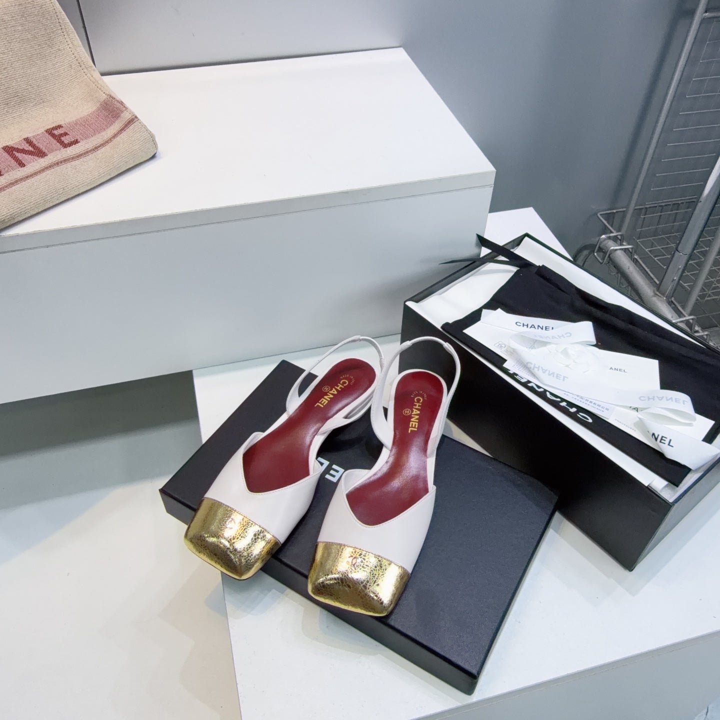 CHANEL 26S FLAT SLINGBACK IN WHITE LAMBSKIN WITH GOLD CAP TOE