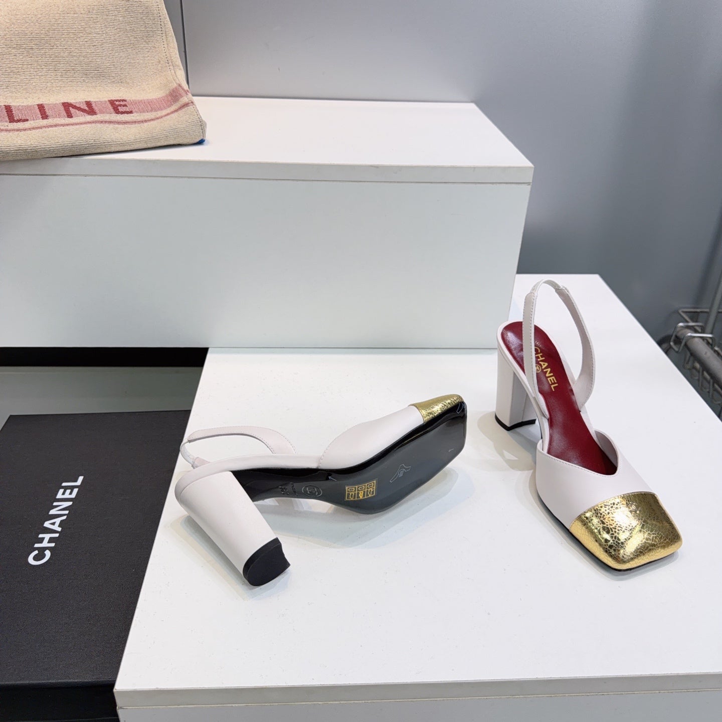 CHANEL 26S SLINGBACK 95 MM IN WHITE LAMBSKIN WITH GOLD CAP TOE