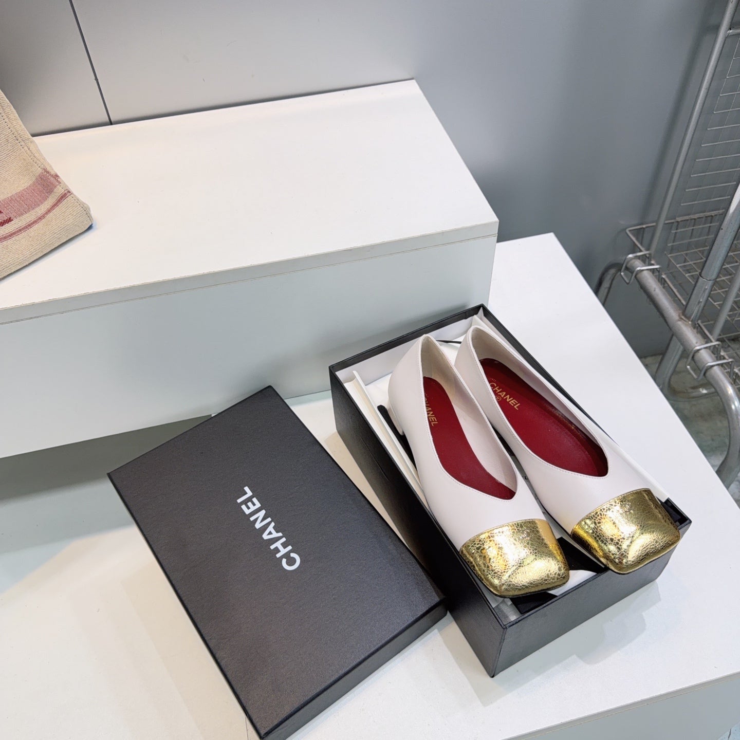 CHANEL 26S FLATS IN WHITE LAMBSKIN WITH GOLD CAP TOE