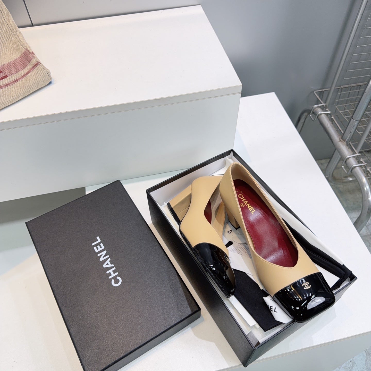 CHANEL 26S SQUARE-TOE HIGH HEELS 55 MM IN BEIGE LAMBSKIN WITH BLACK CAP TOE