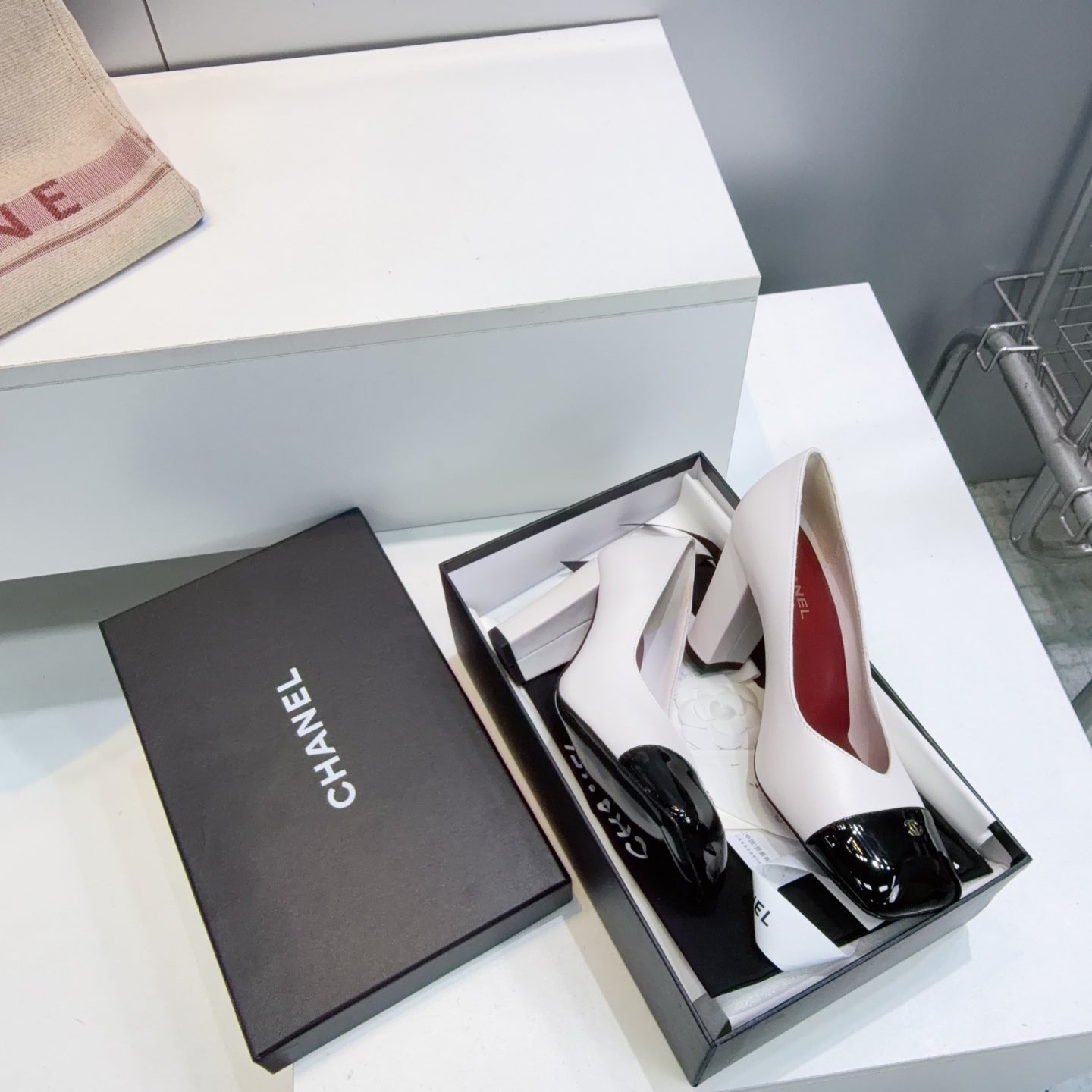 CHANEL 26S SQUARE-TOE HIGH HEELS 95 MM IN WHITE LAMBSKIN WITH BLACK CAP TOE