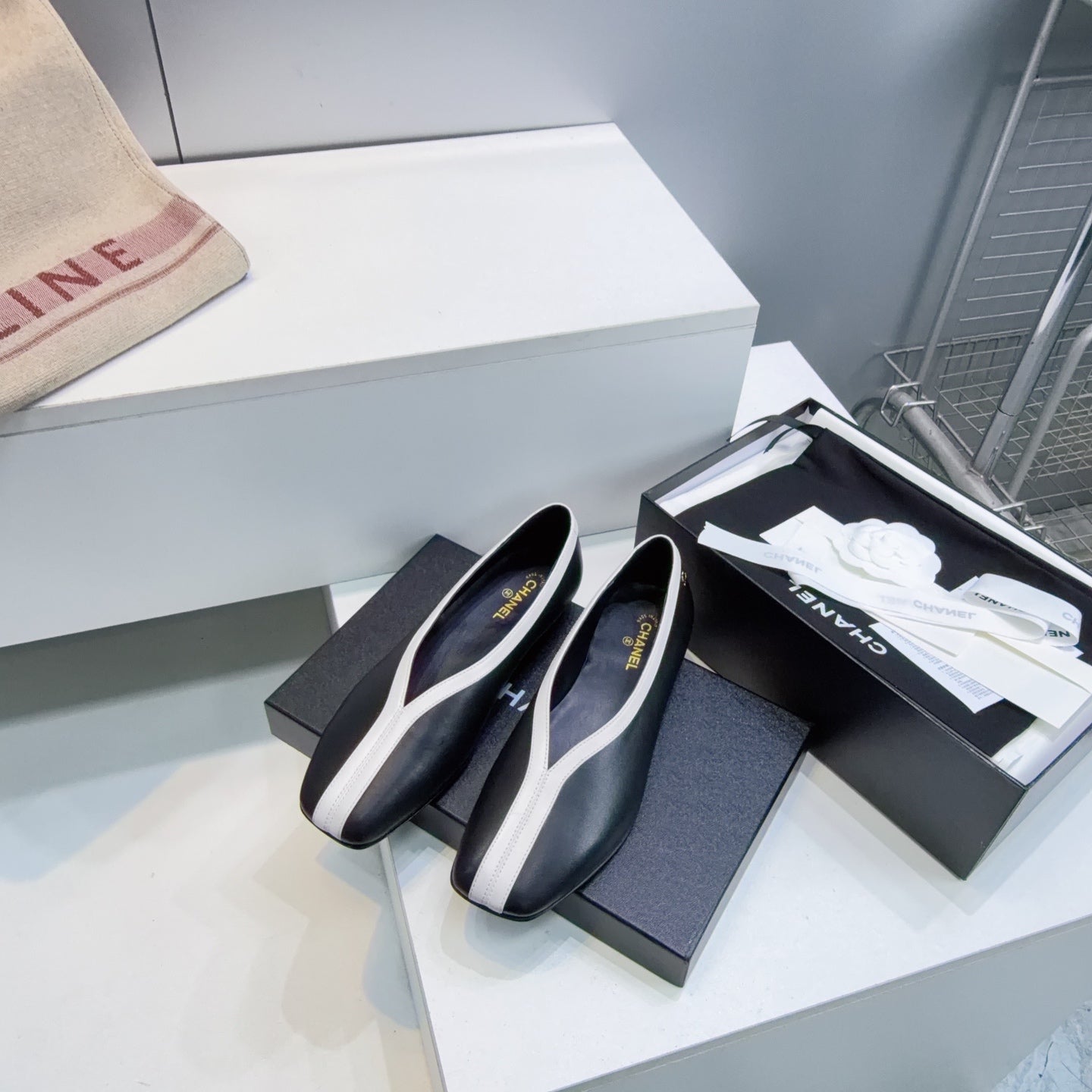 CHANEL 26S SQUARE-TOE FLATS IN BLACK LAMBSKIN WITH WHITE TRIM