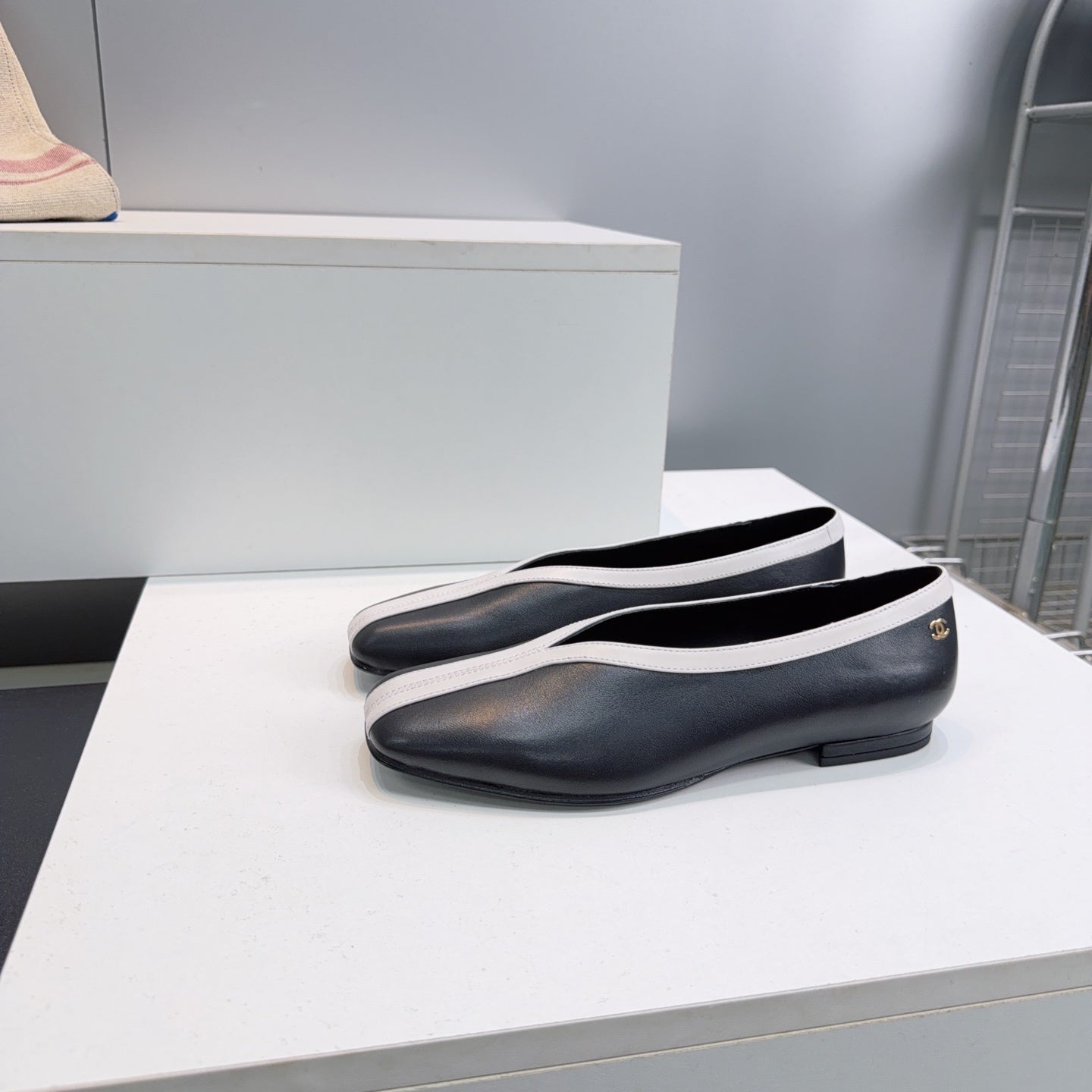 CHANEL 26S SQUARE-TOE FLATS IN BLACK LAMBSKIN WITH WHITE TRIM