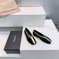 CHANEL 26S SQUARE-TOE FLATS IN BLACK SUEDE WITH GOLD PATENT TRIM