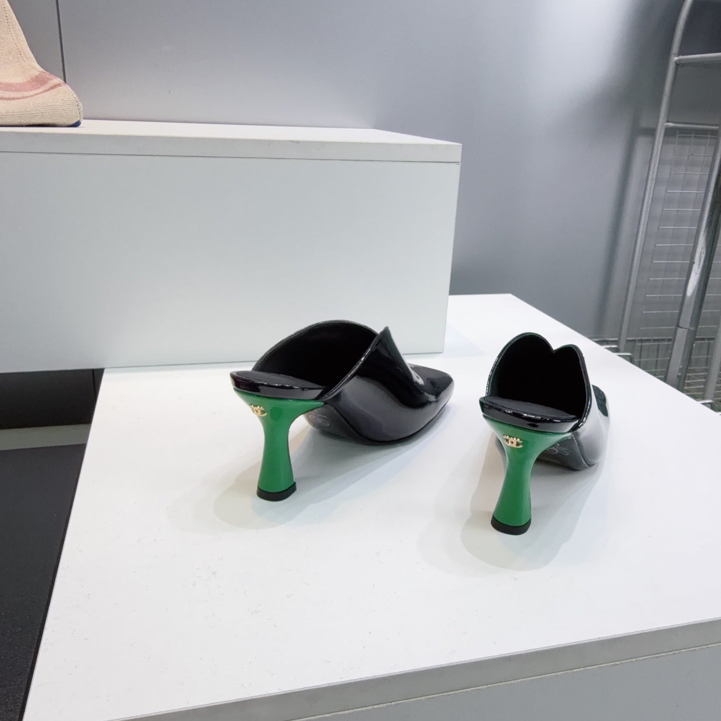 CHANEL 26S HIGH-HEEL MULES 70 MM IN BLACK AND WHITE LAMBSKIN