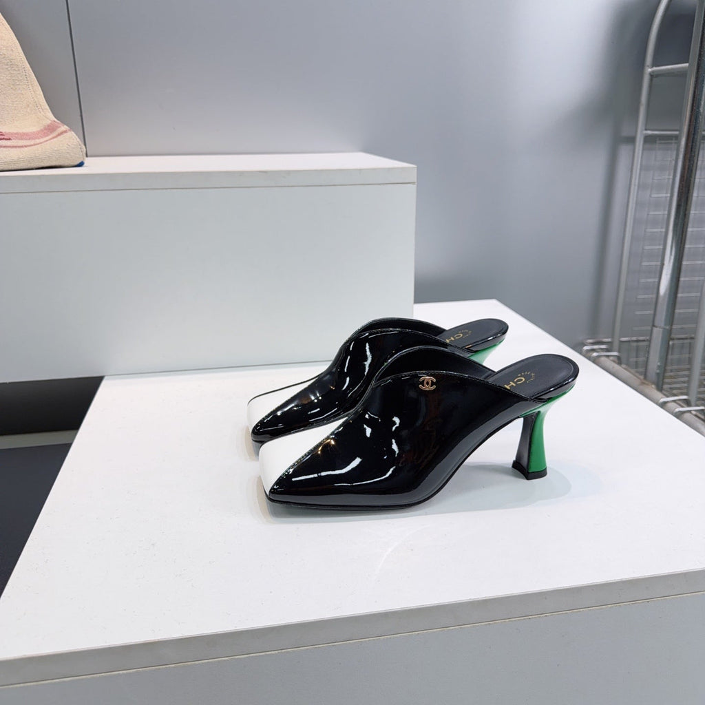 CHANEL 26S HIGH-HEEL MULES 70 MM IN BLACK AND WHITE LAMBSKIN