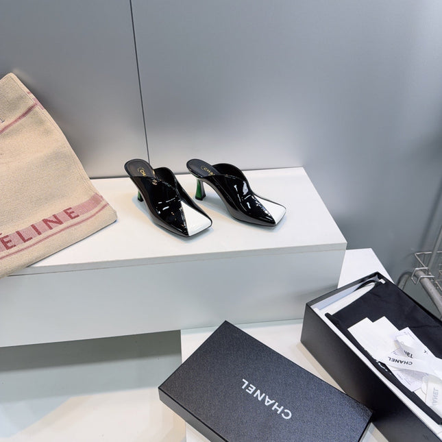 CHANEL 26S HIGH-HEEL MULES 70 MM IN BLACK AND WHITE LAMBSKIN