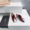 CHANEL 26S HIGH-HEEL MULES 70 MM IN WHITE AND RED LAMBSKIN