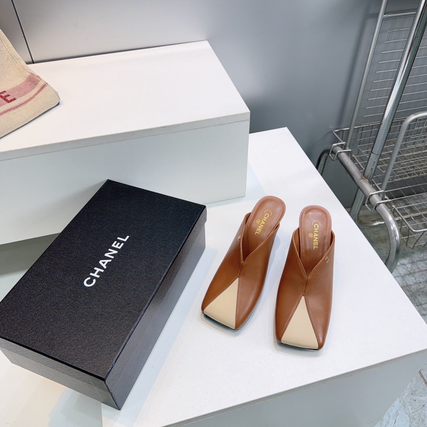 CHANEL 26S HIGH-HEEL MULES 70 MM IN BROWN AND BEIGE LAMBSKIN