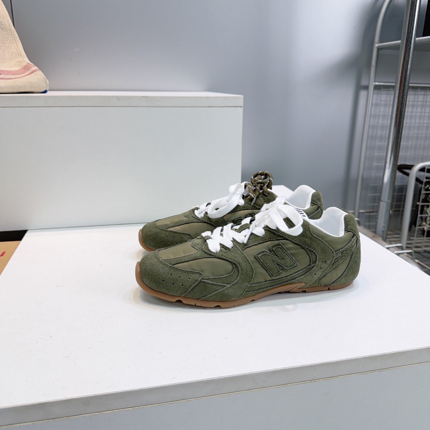 MIUMIU 26S NEW BALANCE SNEAKERS IN OLIVE GREEN SUEDE & FABRIC
