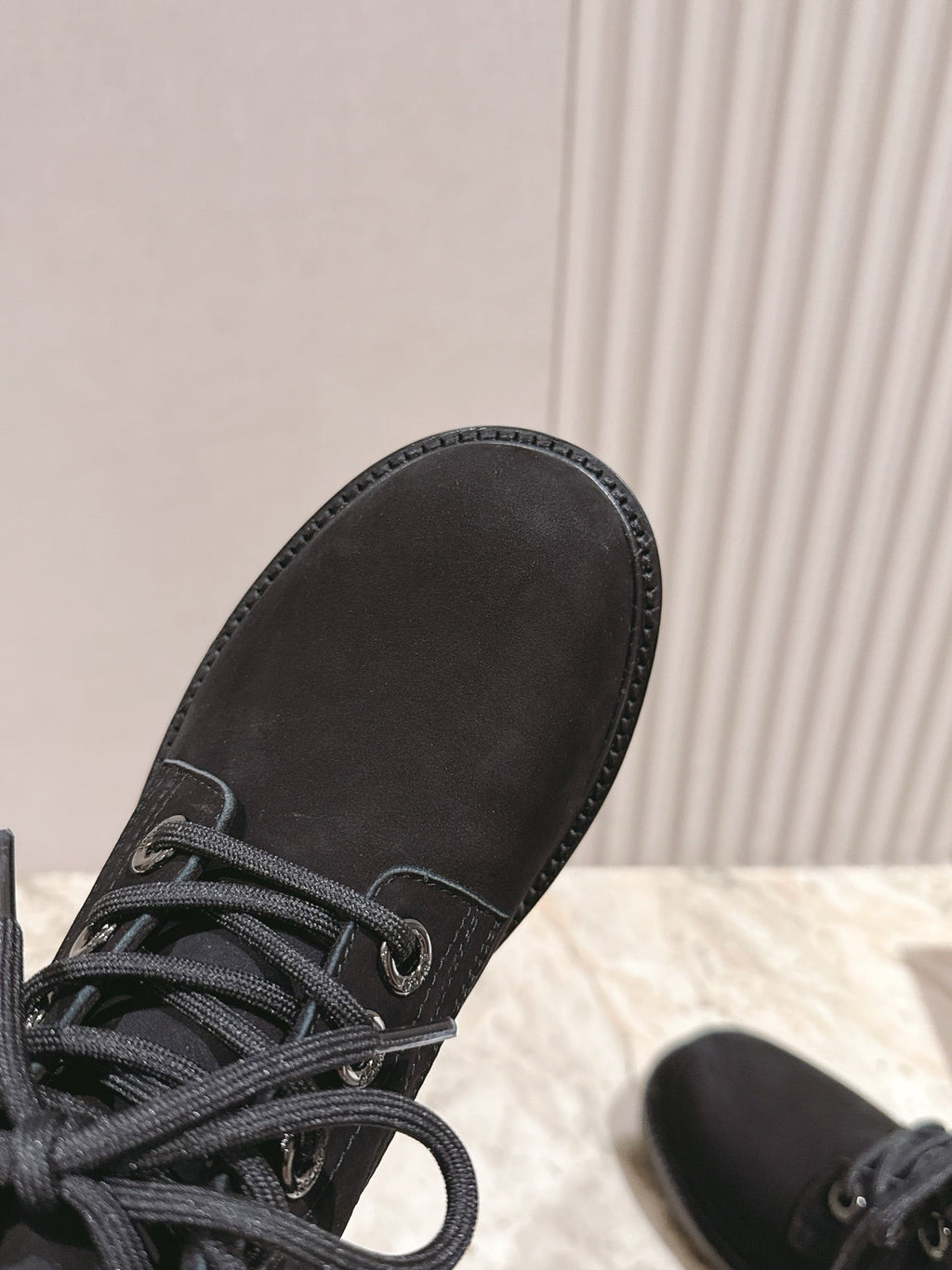 CELINE 25S MARTIN BOOTS IN BLACK CALFSKIN