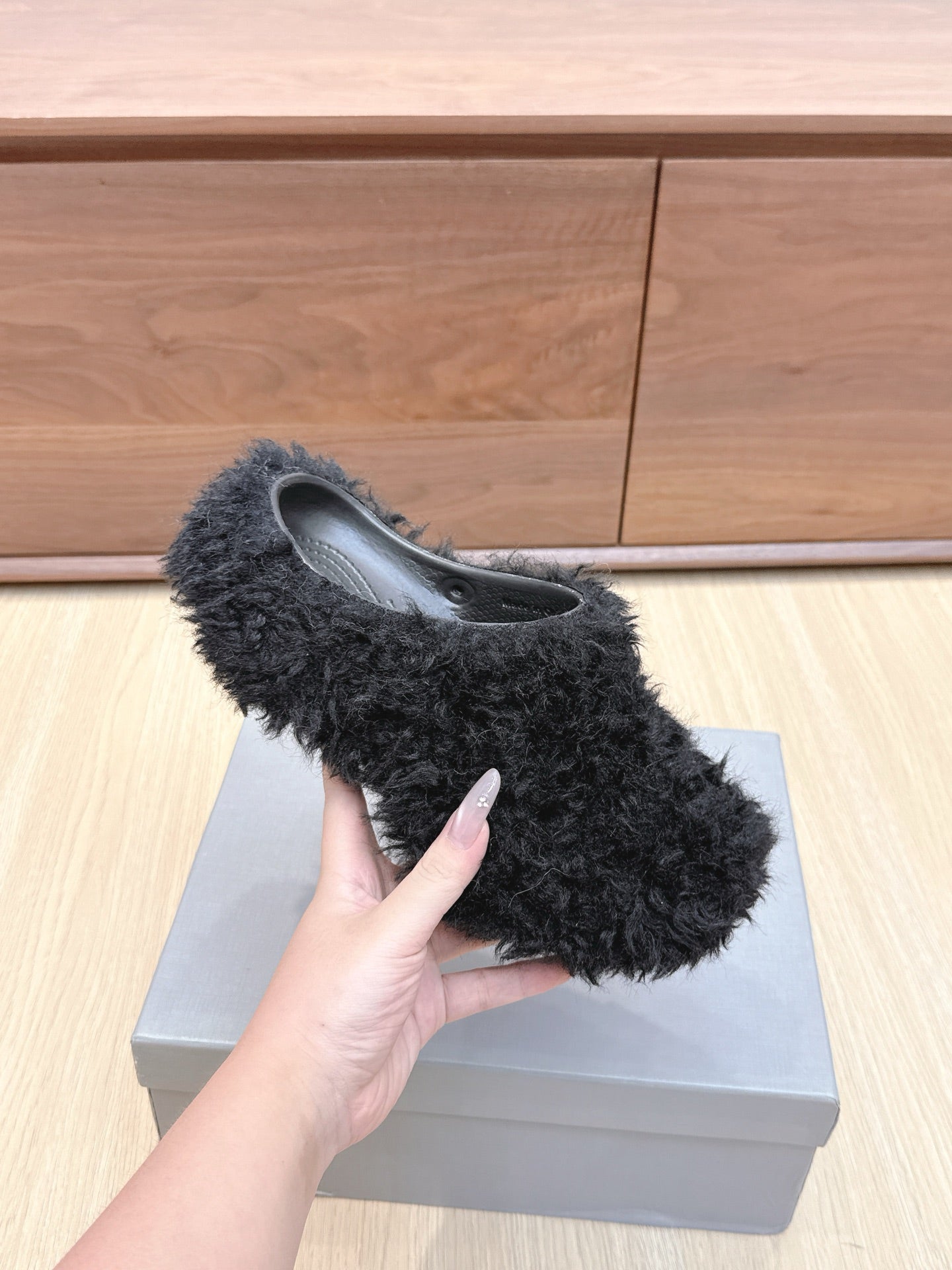 BALENCIAGA 25S MULES IN BLACK FAUX FUR