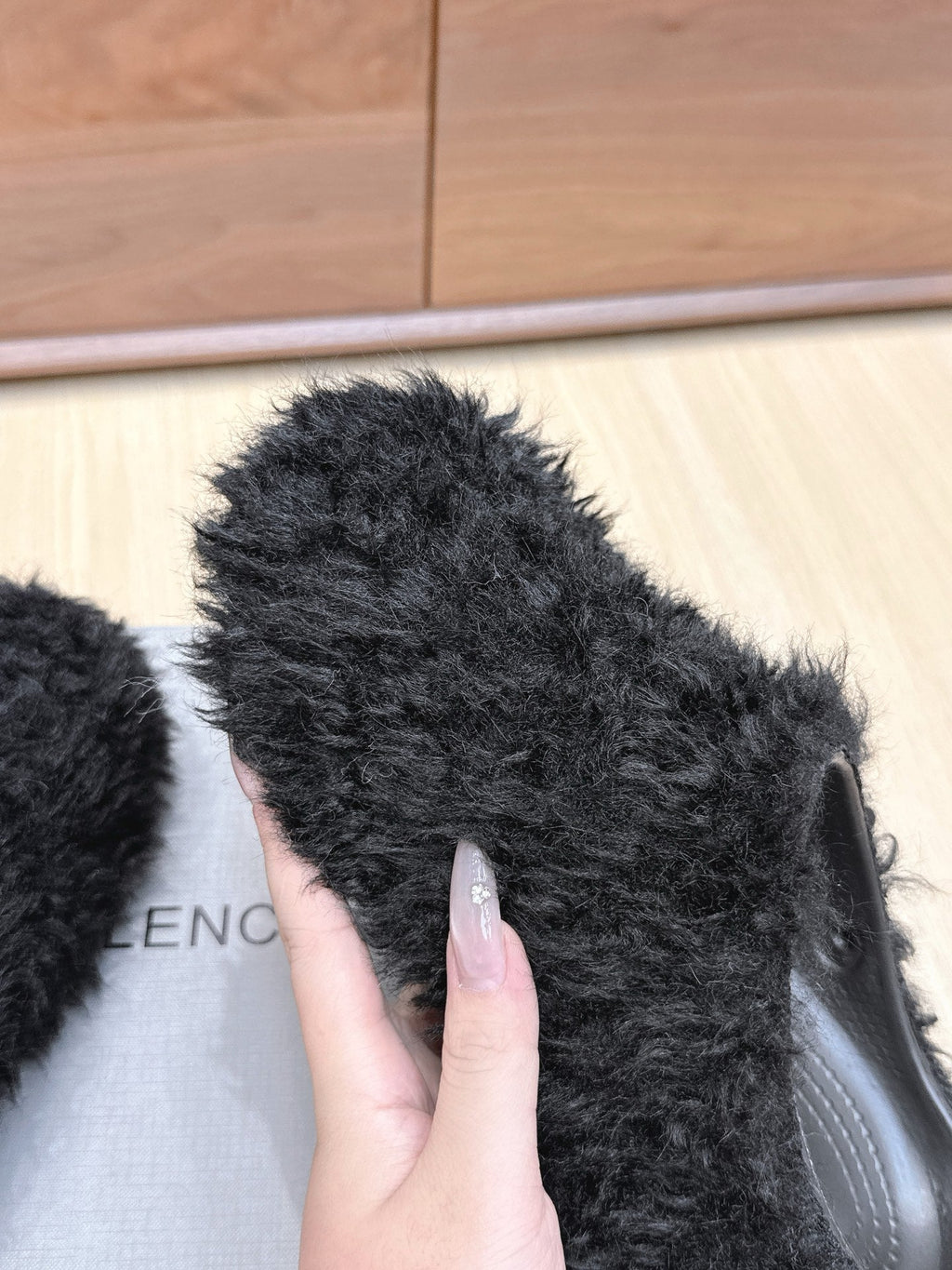 BALENCIAGA 25S MULES IN BLACK FAUX FUR