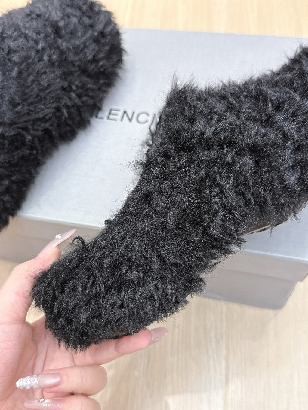 BALENCIAGA 25S MULES IN BLACK FAUX FUR
