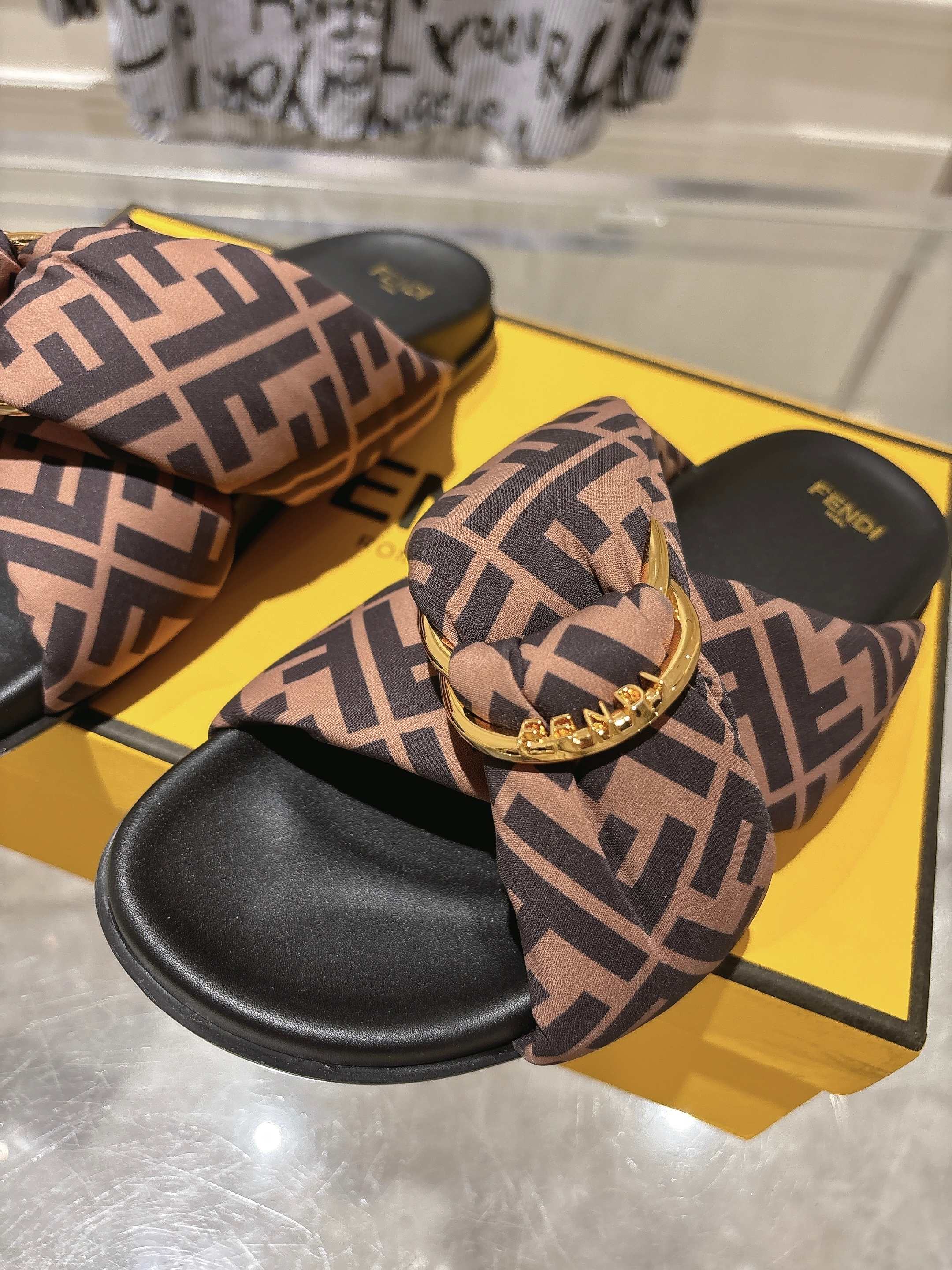 FF KNOT SLIDE SANDALS IN BROWN FABRIC