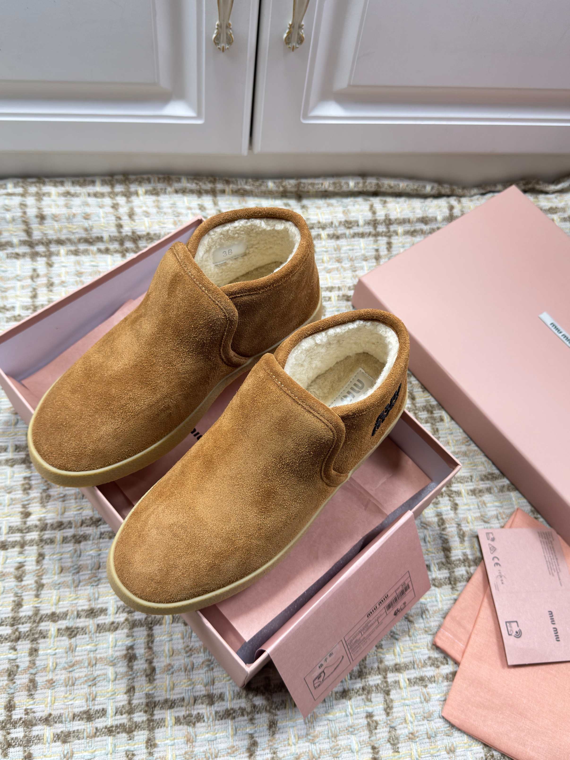 MIUMIU 26S SLIP-ON BOOTIES IN CAMEL BROWN SUEDE WITH SHEARLING