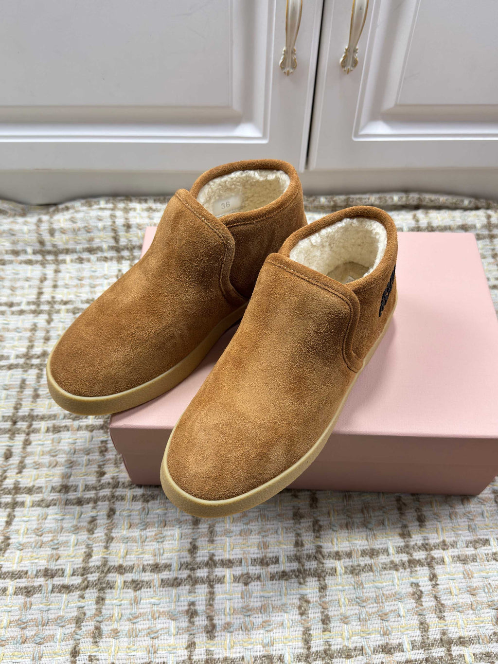 MIUMIU 26S SLIP-ON BOOTIES IN CAMEL BROWN SUEDE WITH SHEARLING