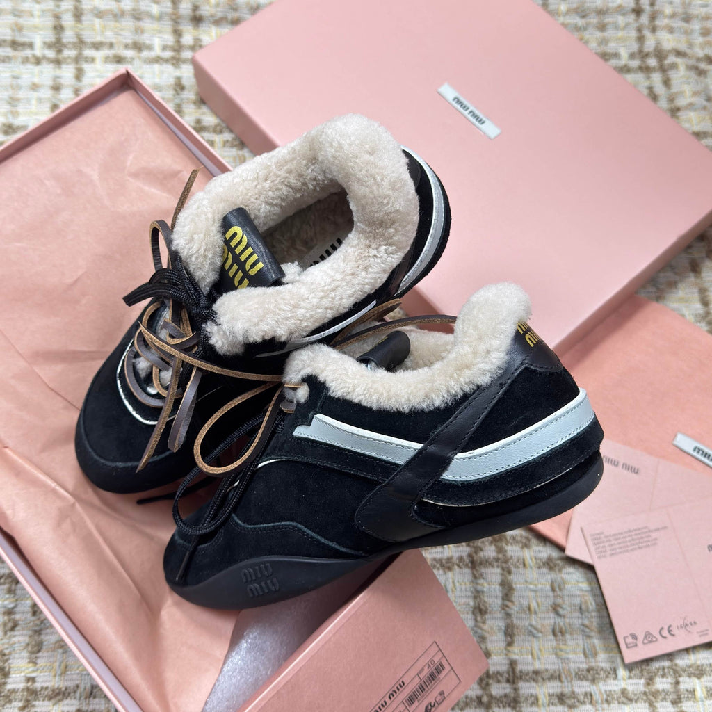 MIUMIU 26S SNEAKERS IN BLACK SUEDE AND SHEARLING