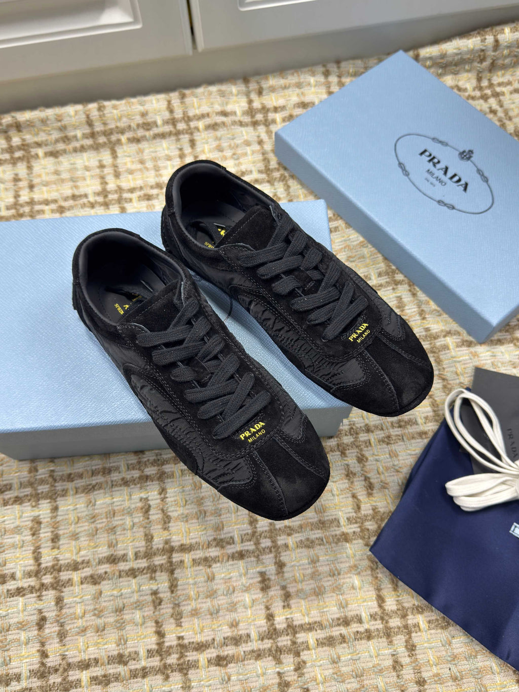 PRADA 26S LOW TOP SNEAKERS IN BLACK NYLON AND SUEDE