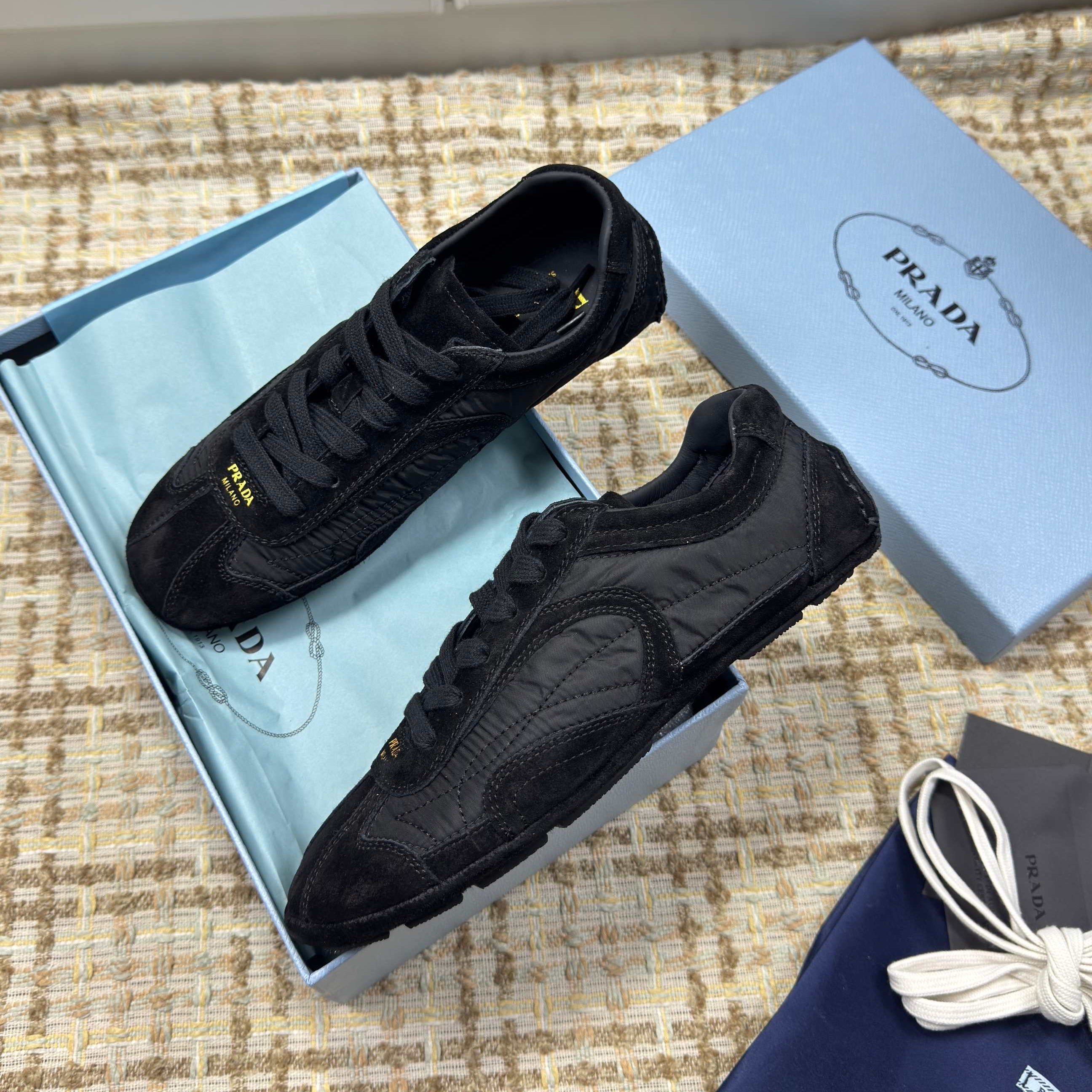 PRADA 26S LOW TOP SNEAKERS IN BLACK NYLON AND SUEDE