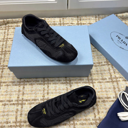 PRADA 26S LOW TOP SNEAKERS IN BLACK NYLON AND SUEDE
