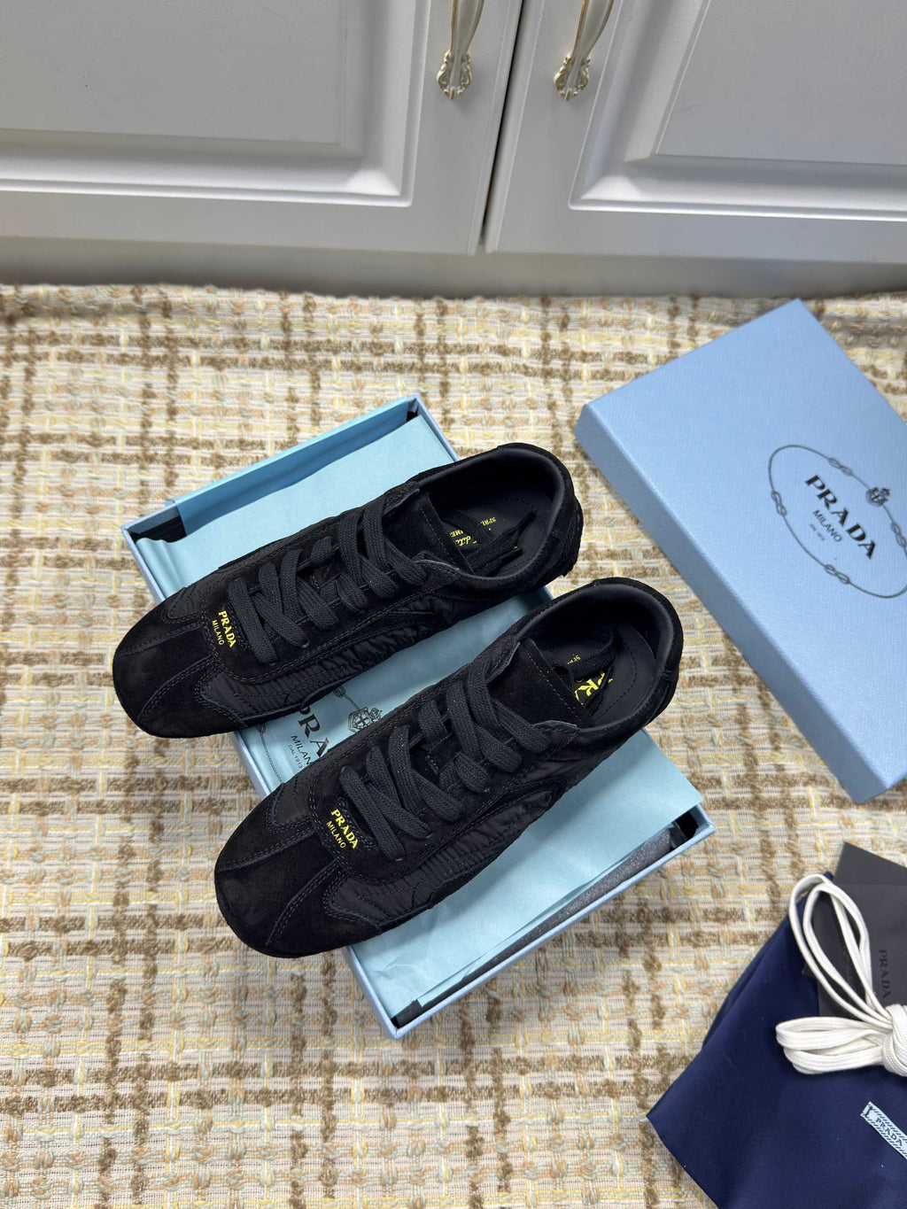 PRADA 26S LOW TOP SNEAKERS IN BLACK NYLON AND SUEDE