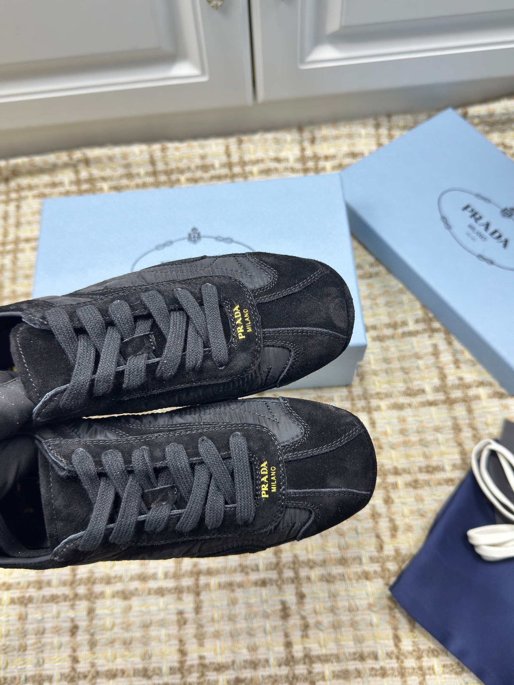 PRADA 26S LOW TOP SNEAKERS IN BLACK NYLON AND SUEDE