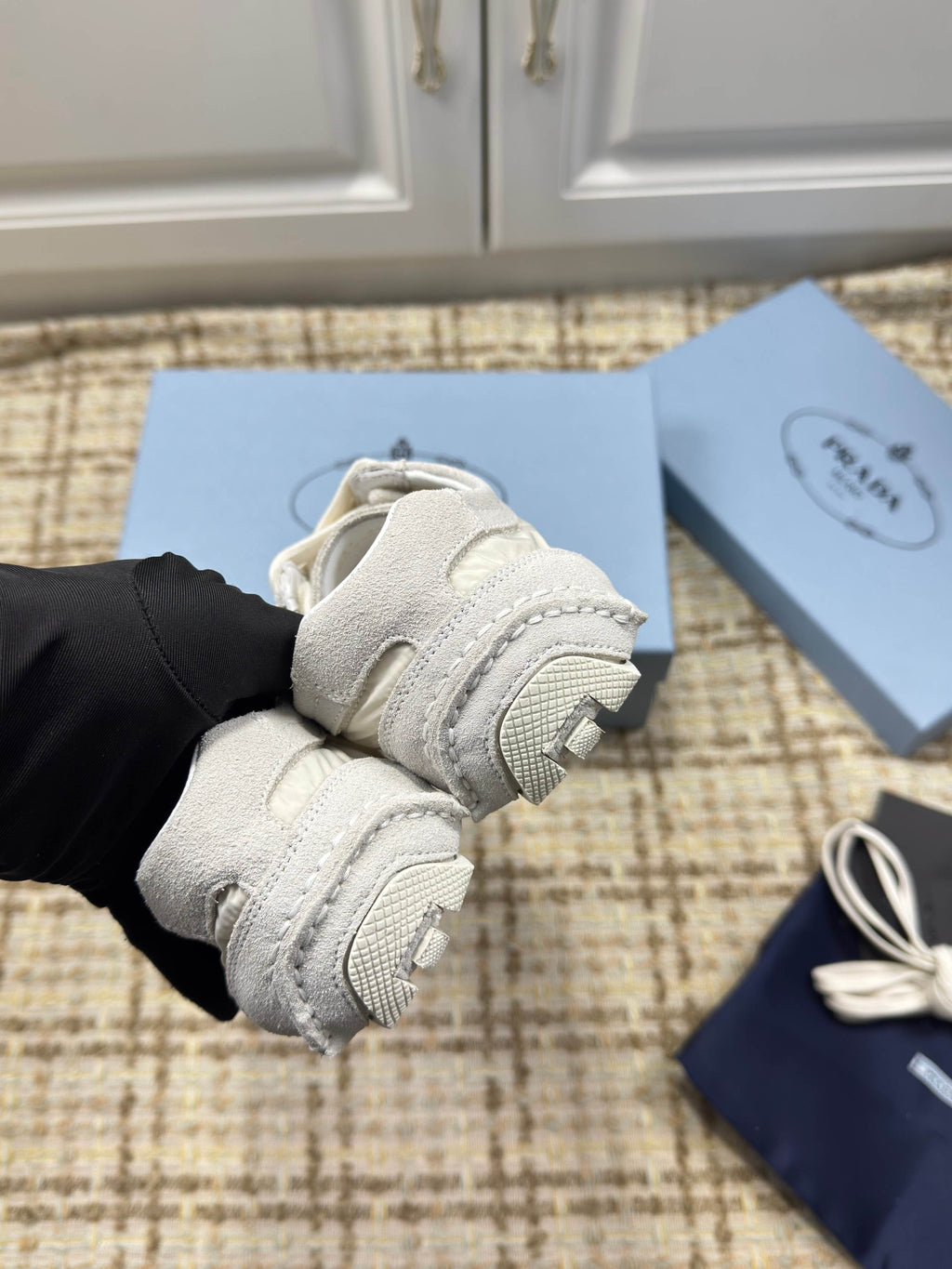 PRADA 26S LOW TOP SNEAKERS IN WHITE NYLON AND SUEDE