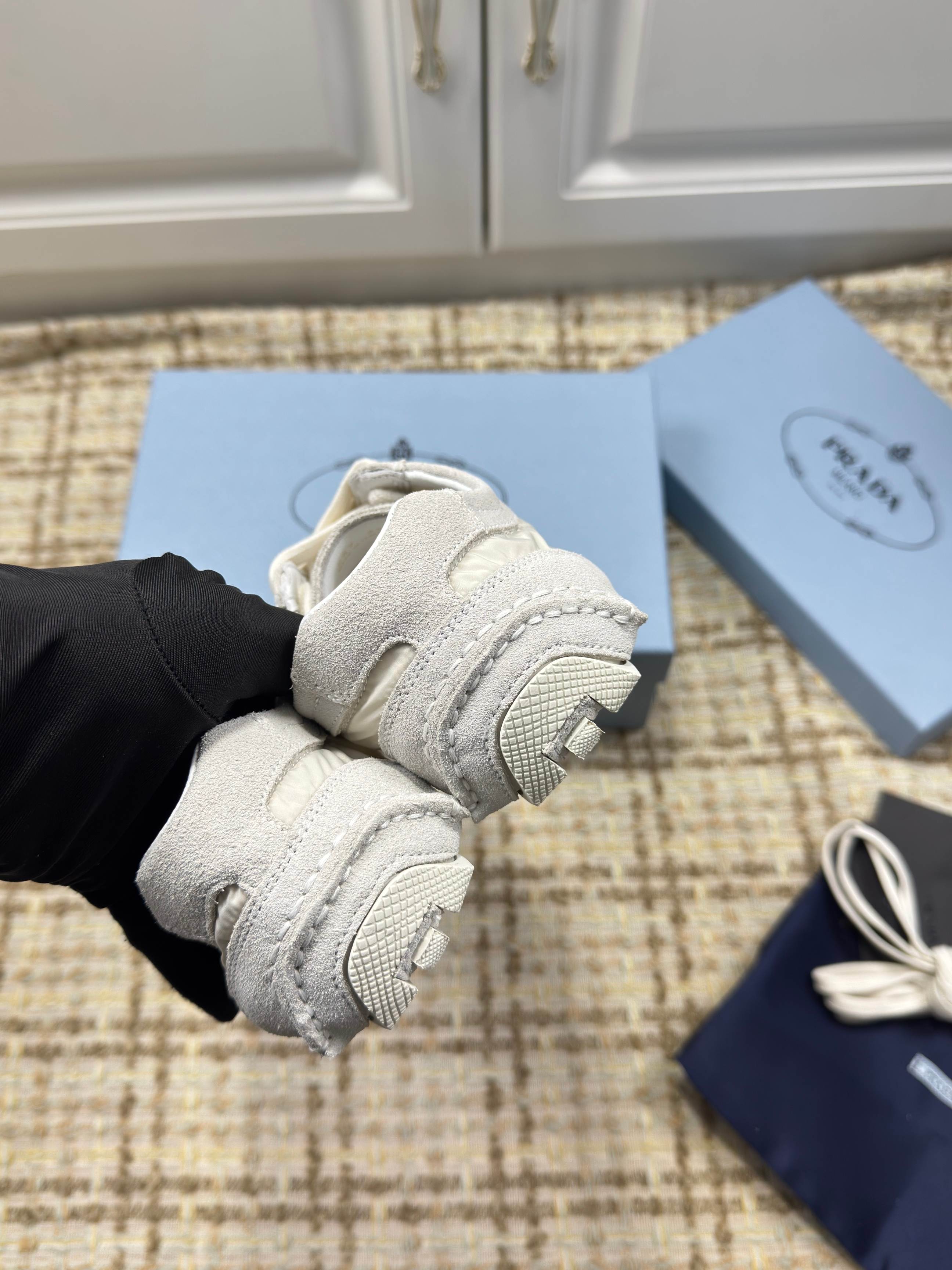 PRADA 26S LOW TOP SNEAKERS IN WHITE NYLON AND SUEDE