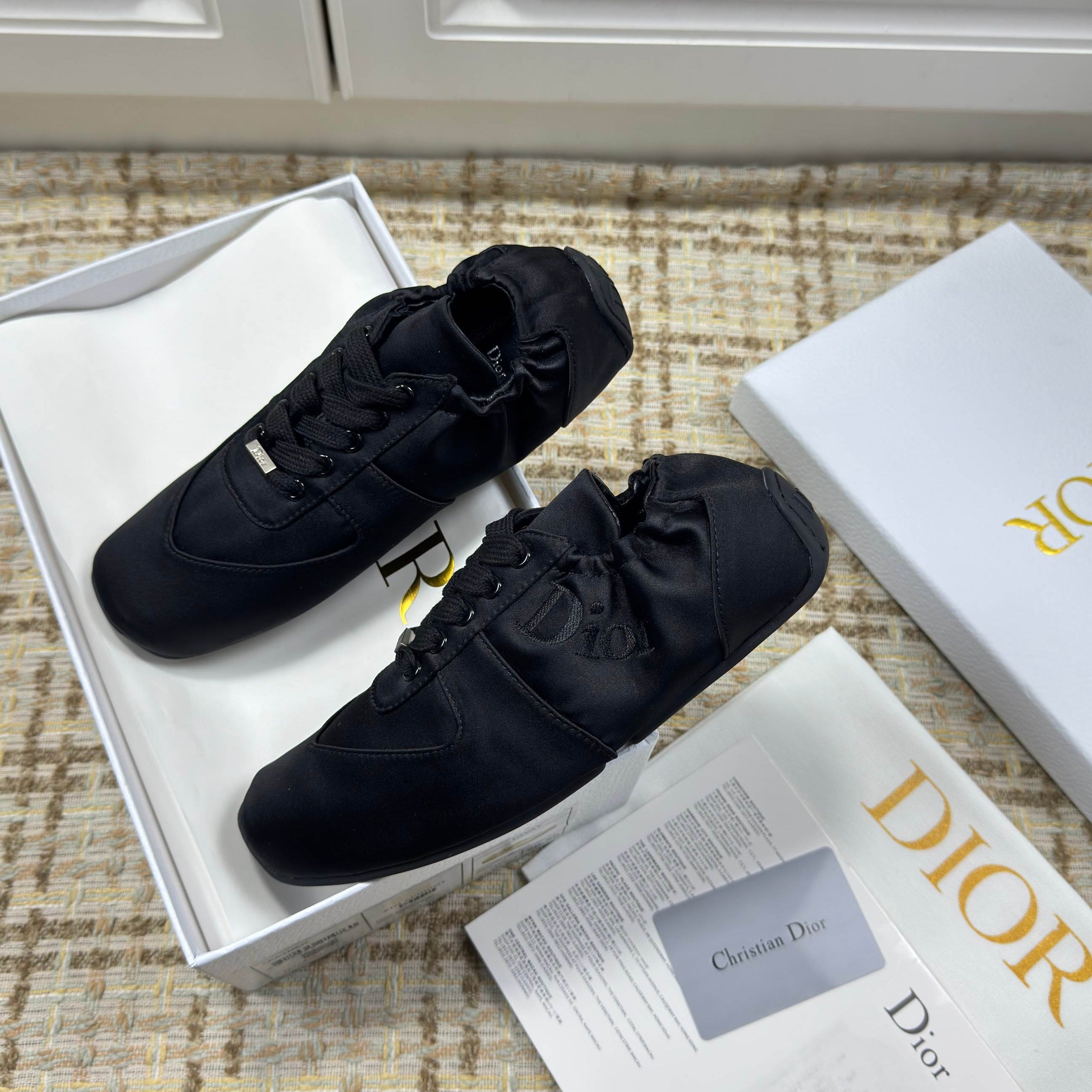 DIOR 26S LOW TOP SNEAKERS IN BLACK SATIN DIOR LOGO
