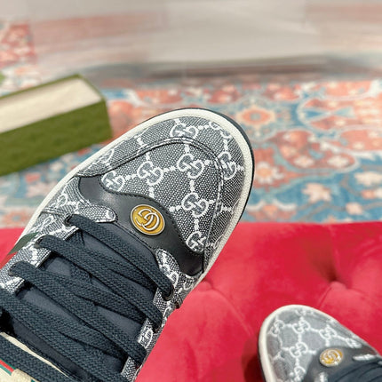GUCCI 26S SCREENER SNEAKER IN BLACK AND WHITE GG CANVAS