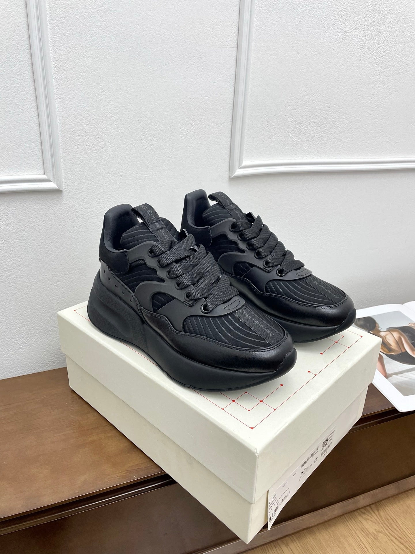 OVERSIZED RUNNER SNEAKERS IN BLACK CALFSKIN AND FABRIC