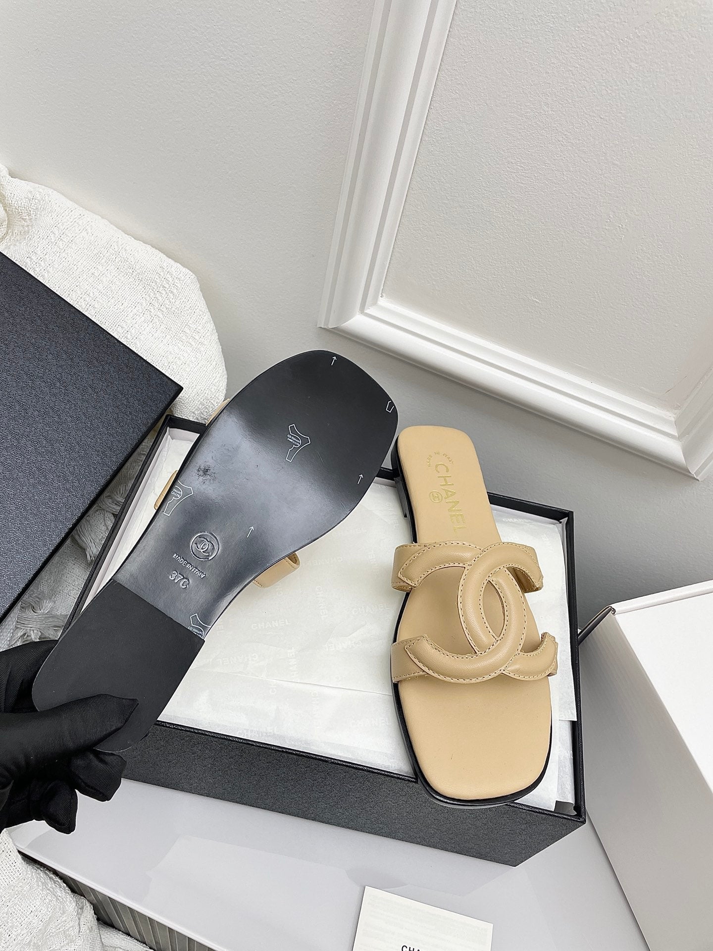 CHANEL CC LOGO MULES IN BEIGE CALFSKIN
