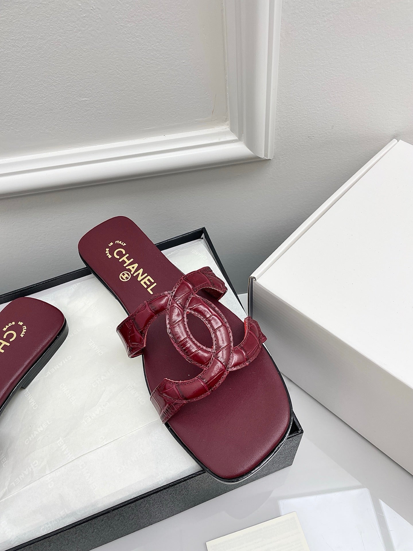 CHANEL CC LOGO MULES IN BURGUNDY CALFSKIN