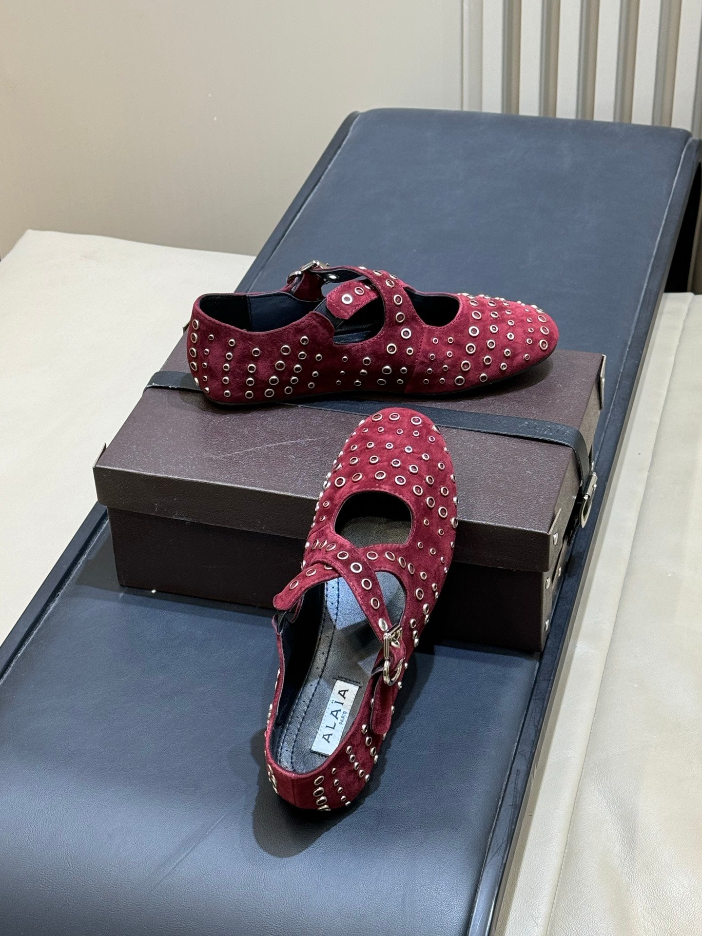ALAIA 26S CROSS-STRAP FLATS IN DARK RED SUEDE WITH SILVER HARDWARE