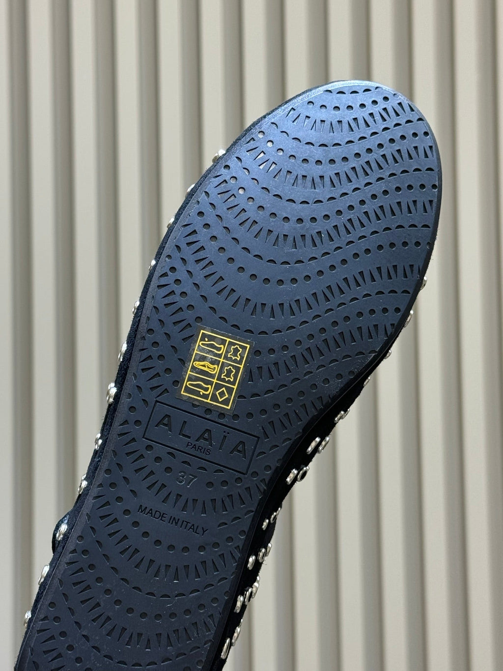 ALAIA 26S CROSS-STRAP FLATS IN BLACK SUEDE WITH SILVER HARDWARE