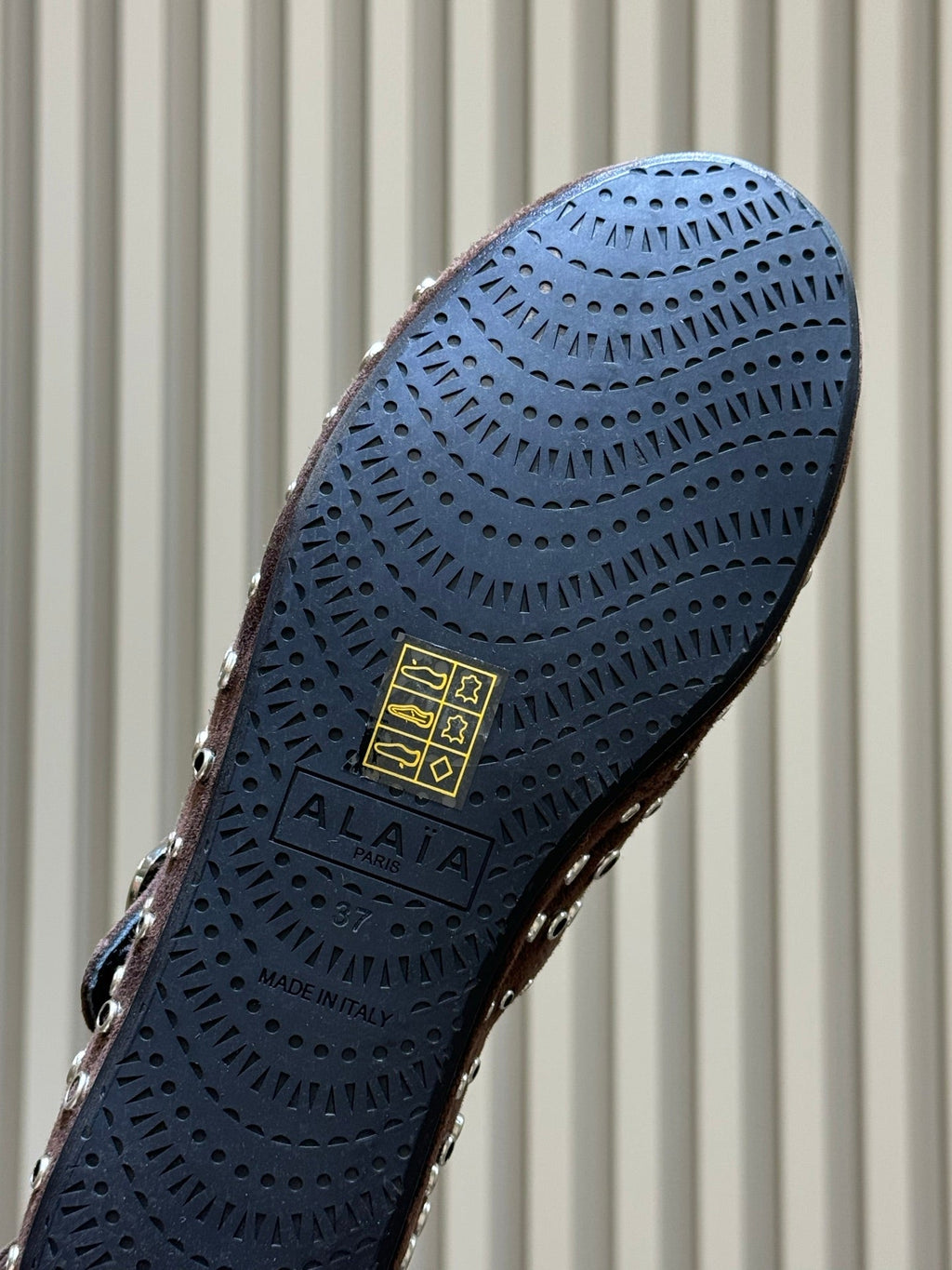 ALAIA 26S CROSS-STRAP FLATS IN DARK BROWN SUEDE WITH SILVER HARDWARE